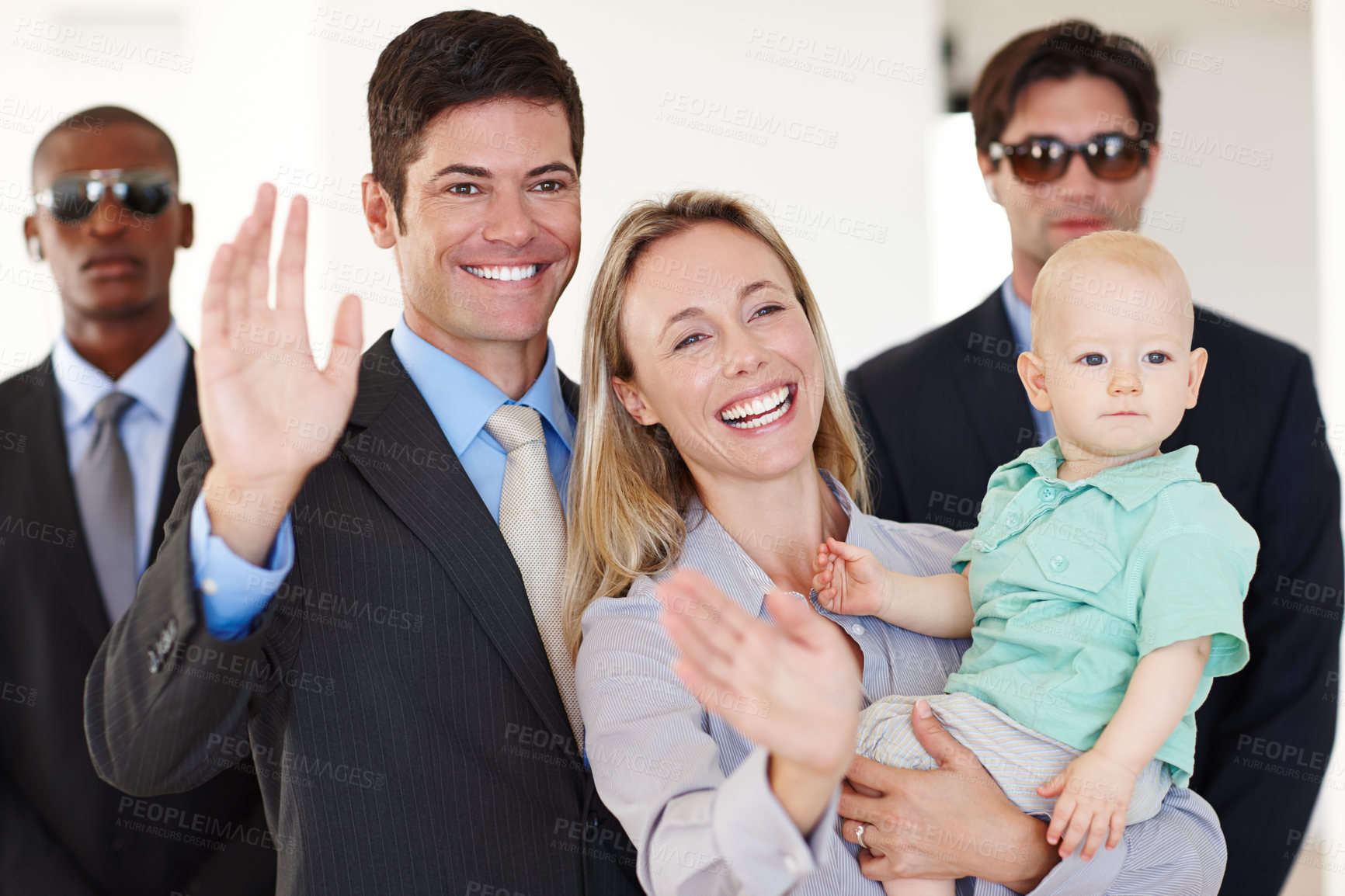 Buy stock photo Waving, politician and couple with security at legal conference for political decision with crowd and fame. Leader or representative with guard and family with baby for alert and protect in public 