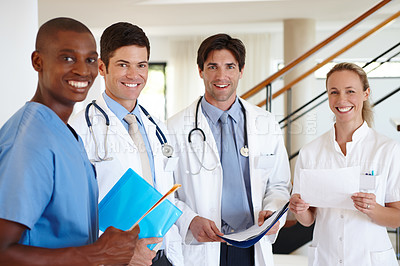 Buy stock photo Portrait of a team of healthcare workers standing together