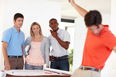 Buy stock photo Mistake, teamwork and architecture in office with blueprint for work project, disaster and working. Global group, collaboration and incident in workplace with fall for accident, desk and surprise