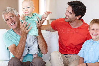 Buy stock photo Grandfather, dad and kids in happy, house and family for  growth, development and childcare on sofa. Mature man, father and children with cheerful, smile and playing in living room for bonding
