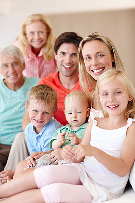 Buy stock photo Portrait of a multi-generational family spending time together at home