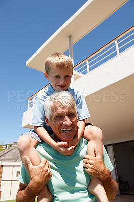 Buy stock photo Child, happy and on senior man shoulder outdoor for playing, bonding or family game. Grandpa, smiling and boy  cheerful for summer time together retirement, holiday or relationship development