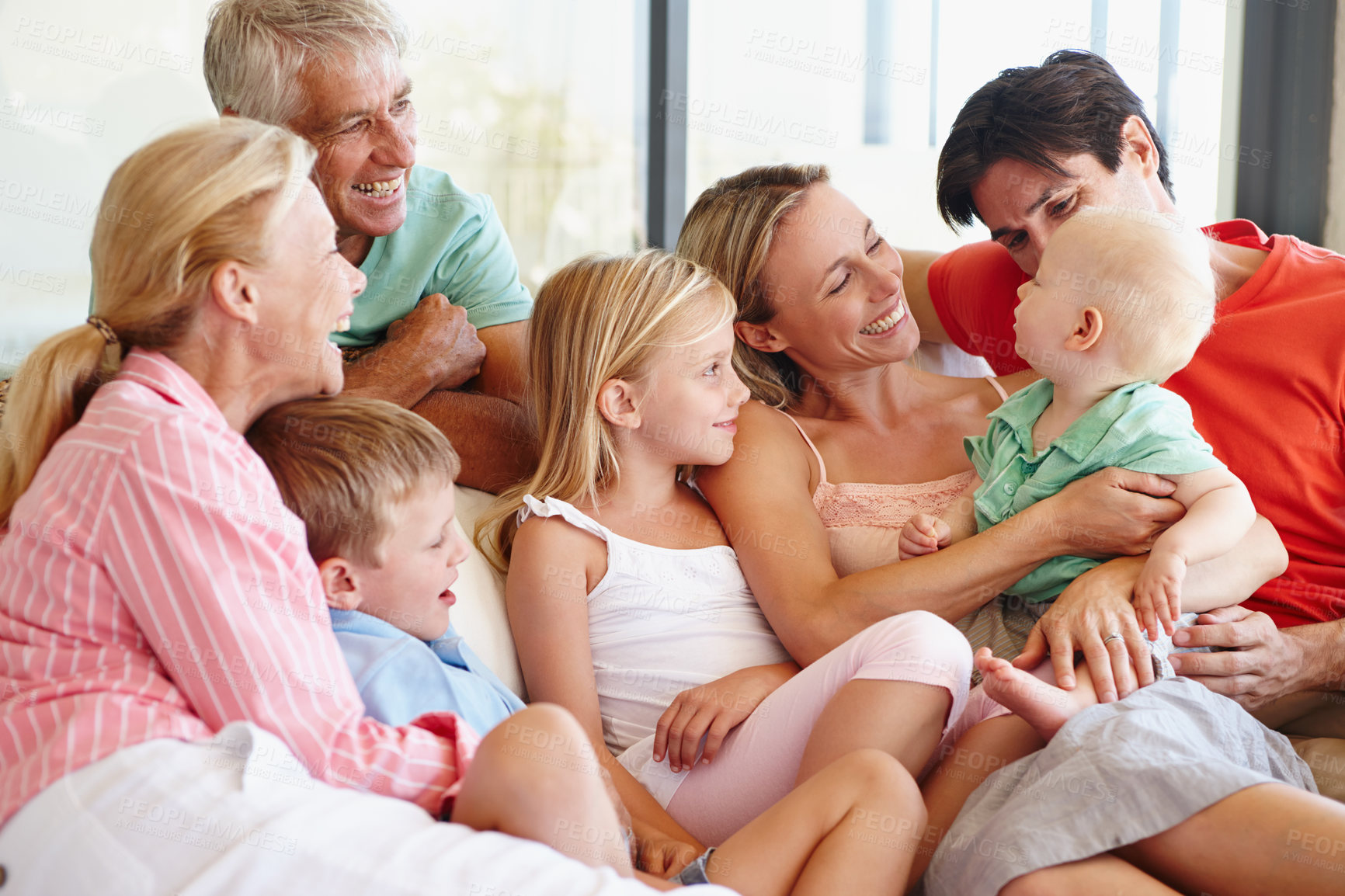 Buy stock photo Shot of a loving multi-generational family spending time together at home