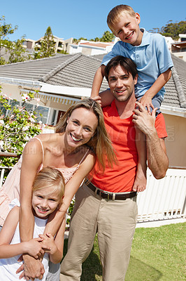 Buy stock photo Portrait, young family or house as real estate property as care, support or love of bonding together. Papa, mama or happy to carry, children or aspiration to become new homeowner of holiday home