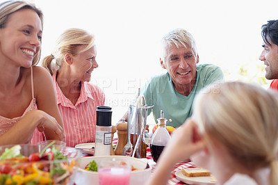 Buy stock photo Family, food and conversation with lunch at table for relationship for relax with healthy eating for wellness. People, meal and celebration for easter with holiday for gathering with nutrition