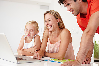Buy stock photo Family, home and laptop with laugh for child development with video, movie and news for entertainment with fun. Dad, mom and daughter in living room on computer for online streaming with tech