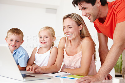 Buy stock photo Family, children and parents with laptop in home for e learning, education and bonding. Mother, girl and boy in house together with dad for teaching, development or support with online class or tech