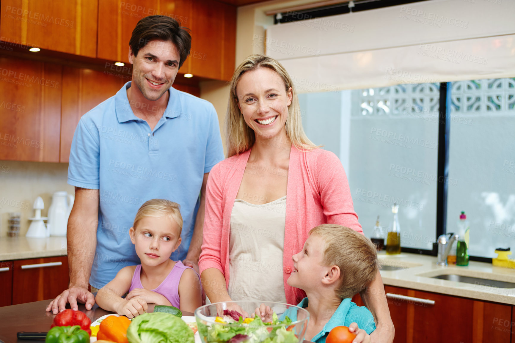 Buy stock photo Happy family, healthy food or kitchen counter in home with smile for dinner, love and connection or together. Wellness, support or children with development in house or cooking, salad for diet health