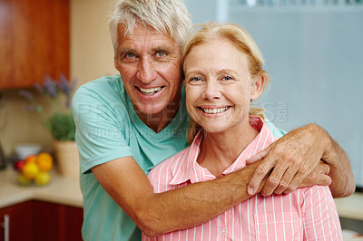 Buy stock photo Portrait, senior couple and hug in house with happiness, retirement and pensioner at home. Mature man, woman and smile in indoor in relationship, together and married as family, connection and love