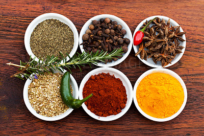 Buy stock photo Cropped shot of an assortment of colorful spices 