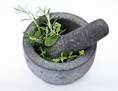 Buy stock photo Cooking, plant mortar and pestle for herbs in studio isolated on a white background. Vegetables, food and equipment for crushing leaf, plants or spices in bowl for seasoning, flavor and healthy diet.