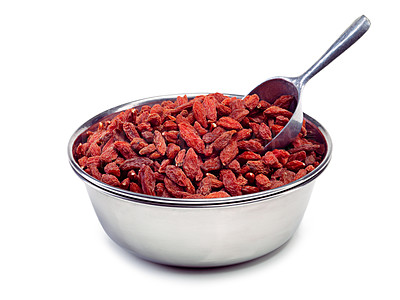 Buy stock photo Goji berries, health and fruit by white background for wellness, nutrition and diet with metal bowl. Chinese wolfberry, organic and vitamins in studio for supplement with super food, fibre and raw