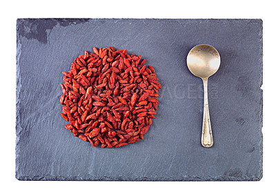 Buy stock photo Pile, healthy and goji berries with spoon in studio for nutrition, organic and antioxidant as snack for health. Vegan, fruit and seeds produce vitamin c for wellness on isolated white background