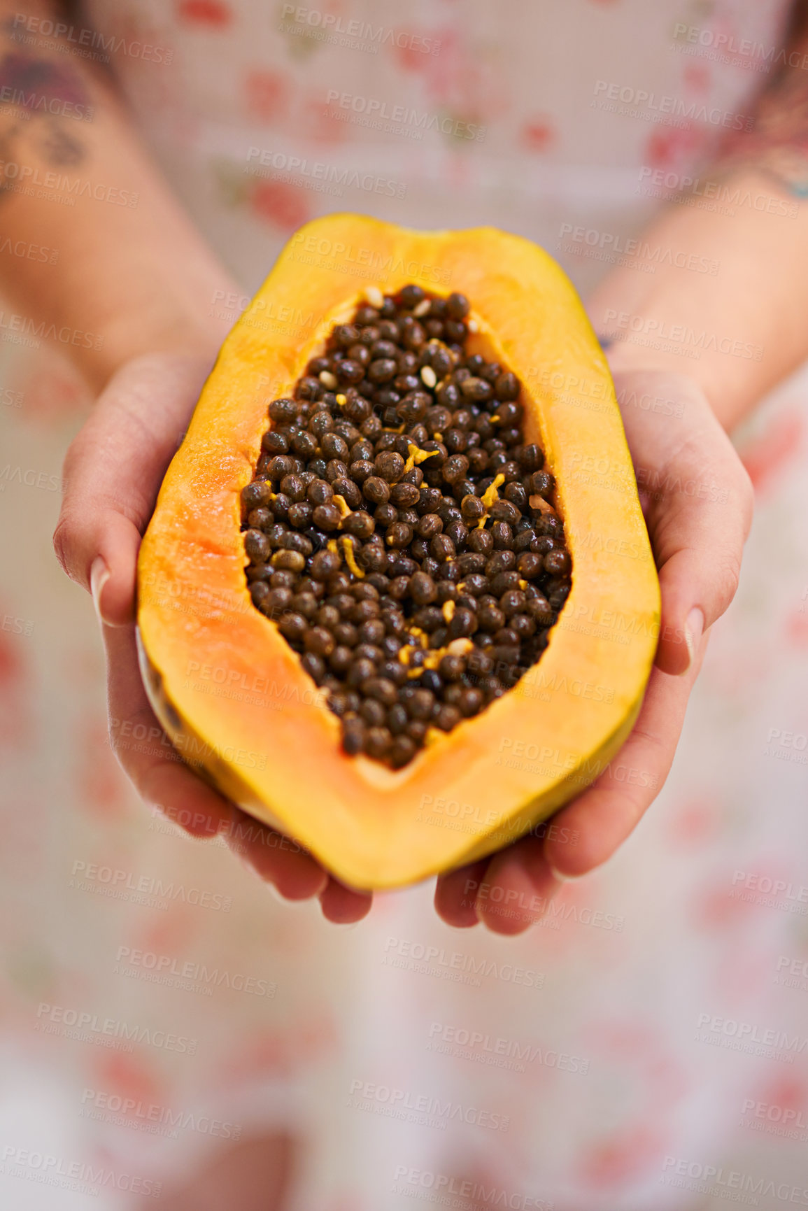 Buy stock photo Hands, person and papaya in half with nutrition for healthy eating with seeds, nutrients and wellness. Food, pawpaw and diet with fruit for weight loss with vitamin c for balance with freshness