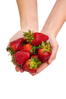 Buy stock photo Cropped studio shot of a bunch of strawberries in a person's cupped hands