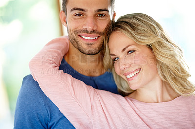 Buy stock photo Portrait of an affectionate young couple at home