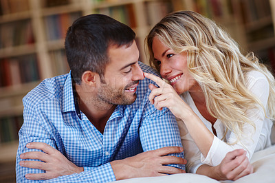 Buy stock photo Happy, woman and affection to husband at home in lounge for weekend away with love, trust and peace as partners. Married, couple and vacation for romance break, relax and bonding in safety of house