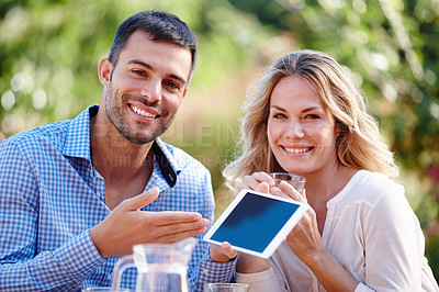 Buy stock photo Happy couple, portrait and show tablet in garden for internet, advertising and communication. Man, female person and outdoors at home for mobile, meme and social media scrolling for online platform.