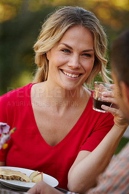 Buy stock photo Woman, happy or smiling with cup on picnic date with partner for love, romance and memories together. Person, drinking and eating healthy meal with boyfriend for conversation, bonding or relationship