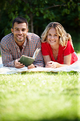 Buy stock photo Couple, grass and park with book in portrait for relax, reading or together with notebook. Man, woman and nature for stress relef or break and bonding, chill or picnic and relationship with holiday