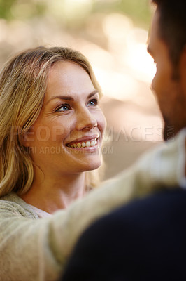 Buy stock photo Couple, hug and looking in park for love, care and commitment to relationship in outdoor nature. Happy people, bonding and embrace in marriage, romance and together on vacation or holiday date