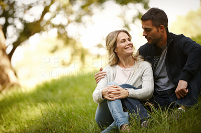 Buy stock photo Couple, embrace and outdoor marriage on grass, together and love in relationship or bonding in park. Happy people, support and hug on holiday or vacation in nature, relax and commitment on date