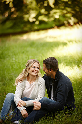 Buy stock photo Couple, embrace and outdoor love on grass, together and care in relationship or bonding in park. Happy people, support and hug on holiday or vacation in nature, relax and commitment on romance date