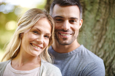 Buy stock photo Portrait, couple and happy in park for love, bonding with care and support in healthy relationship. Man, woman and smile outdoor for date with romance, trust and commitment for marriage or partner