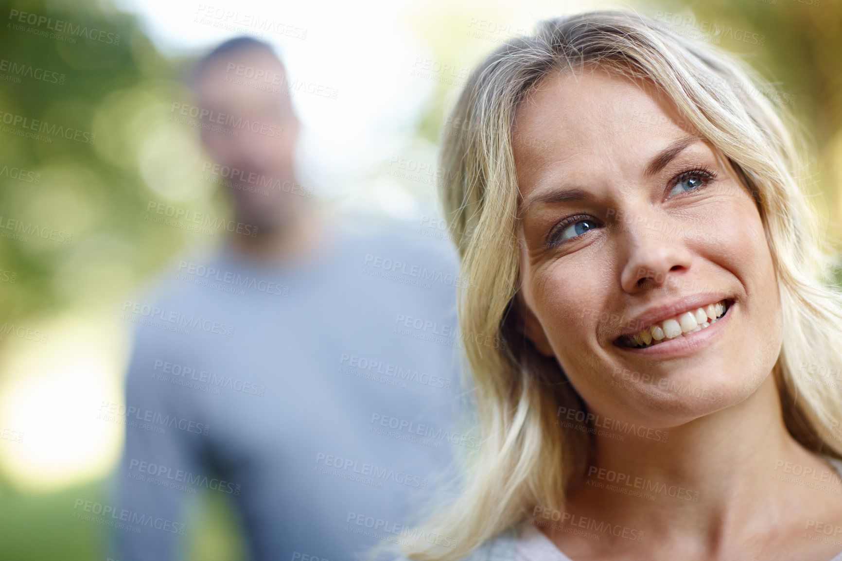 Buy stock photo Woman, thinking and smiling outdoor with idea or vision in summer by nature for park walk, happiness and date. Female person, looking and planning outside in forest for freedom, calm and peace