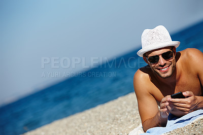 Buy stock photo Man, beach and smartphone in portrait on holiday with ocean on seashore with blue sky in summer for peace. Male person, vacation and relax with phone for memories in cancun with wellness on trip