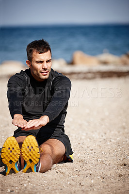 Buy stock photo Male person, stretching and sports at beach for exercise with fitness warm up, sand and outdoor sunshine. Man, training and nature by ocean with workout for wellness, strong body and health activity