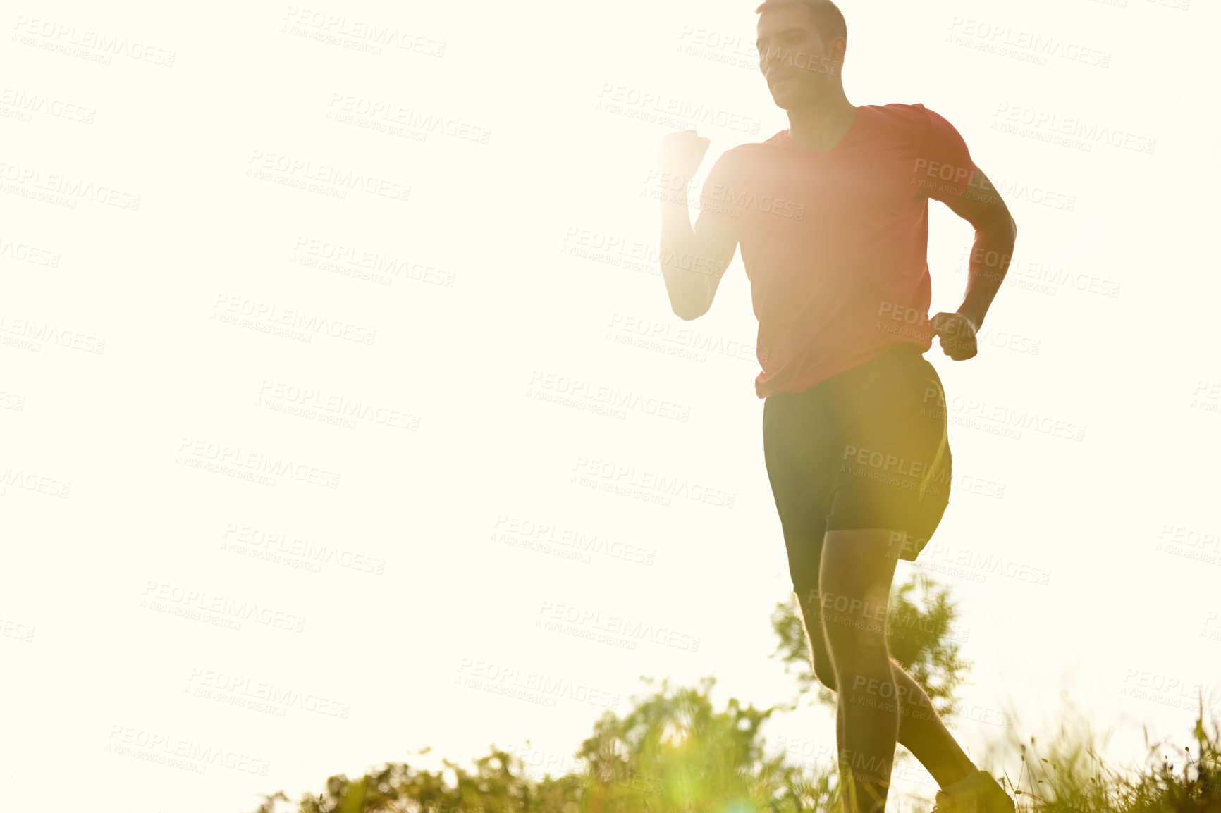 Buy stock photo Man, outdoors and trail running with athlete for training with endurance for physical fitness. Male person, cross country and back with lens flare for routine, race and performance in balance