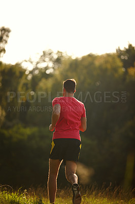 Buy stock photo Rear view, man and run for exercise, fitness and workout for body health and physical training outdoor. Male runner or athlete and jog for cardio, strength or recreation on trail outside in nature