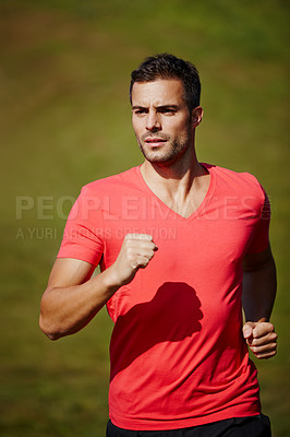 Buy stock photo Running, athlete and serious man outdoor with energy for practice, exercise and health in nature. Workout, runner and training for marathon, forest and performance of speed of male person for fitness