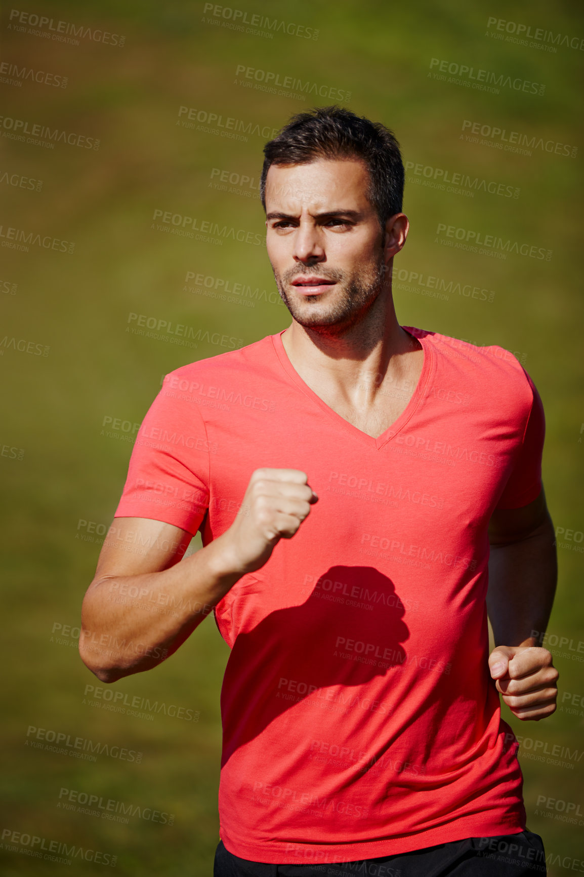 Buy stock photo Running, athlete and serious man outdoor with energy for practice, exercise and health in nature. Workout, runner and training for marathon, forest and performance of speed of male person for fitness