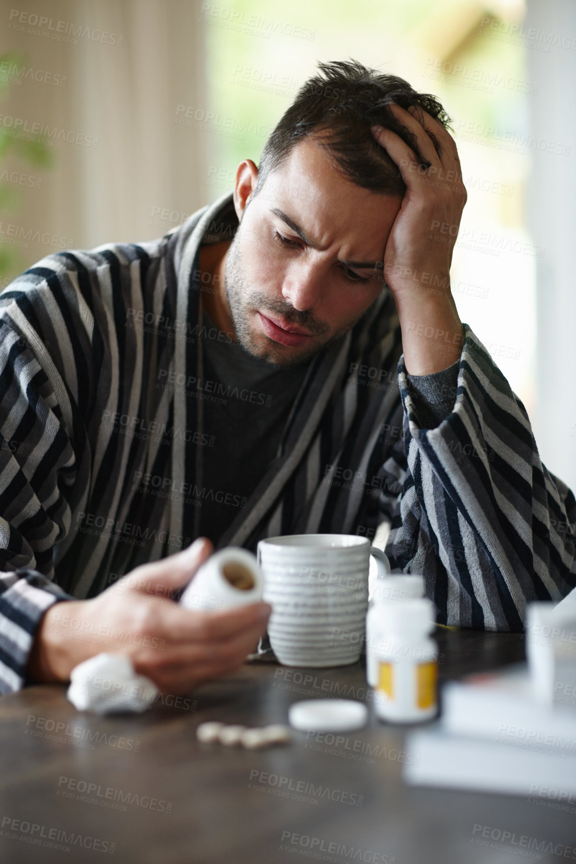 Buy stock photo Sick, man and reading vitamin medicine at home holding mug with herbal tea for recovery. Happy, male and pills for illness, disease and virus smiling for good news on positive health results 