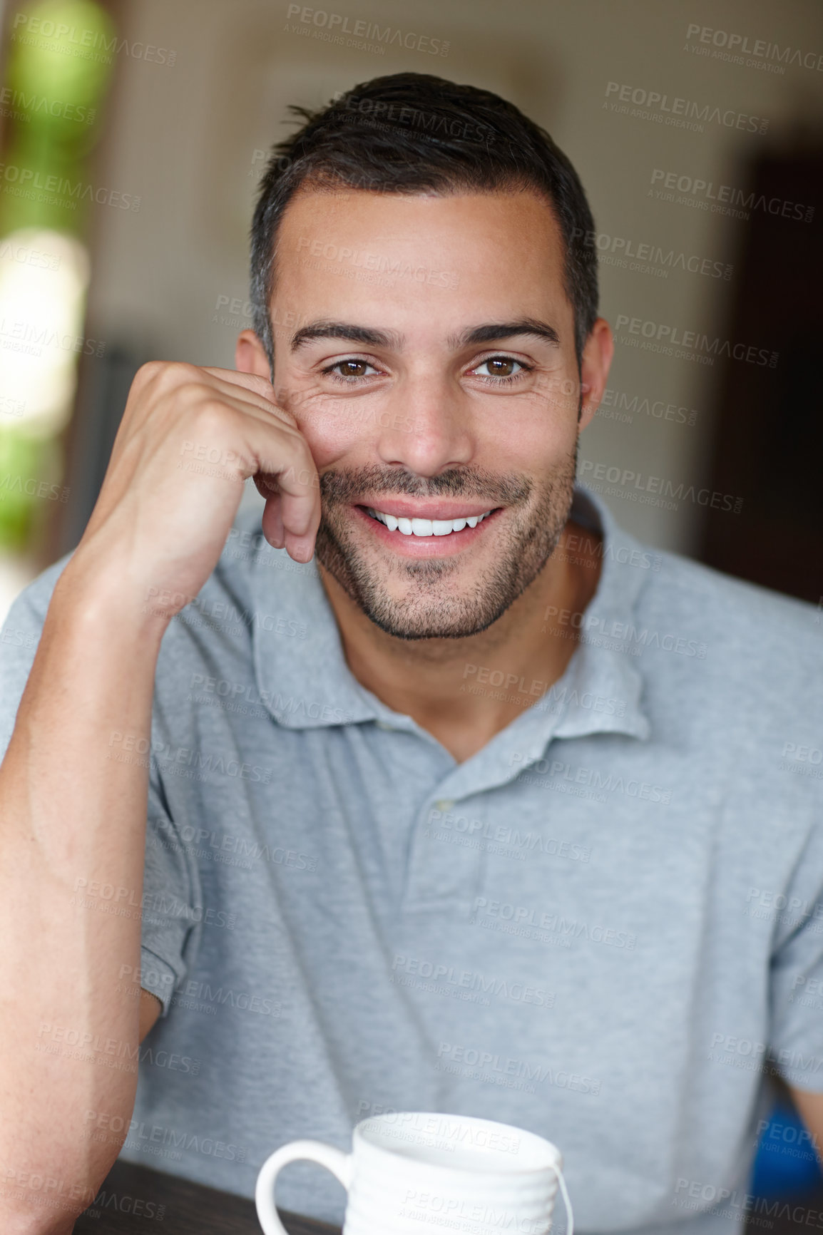 Buy stock photo Man, smile or happy in home portrait for social media, casual work or morning routine. Person, confident and relaxed in house with tea cup for remote job, freelancing or company portfolio set up