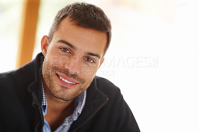 Buy stock photo Portrait, happy man and relax in house for peace with smile, teeth and self care. Calm, happiness and face of handsome male person in home interior for wellness, positive mindset and casual comfort