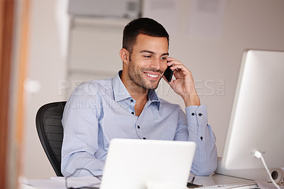 Buy stock photo Man, computer and phone call in office for networking, schedule and business deal negotiation. Male person, smile and app for conversation or talking, internet and connection for planning agenda