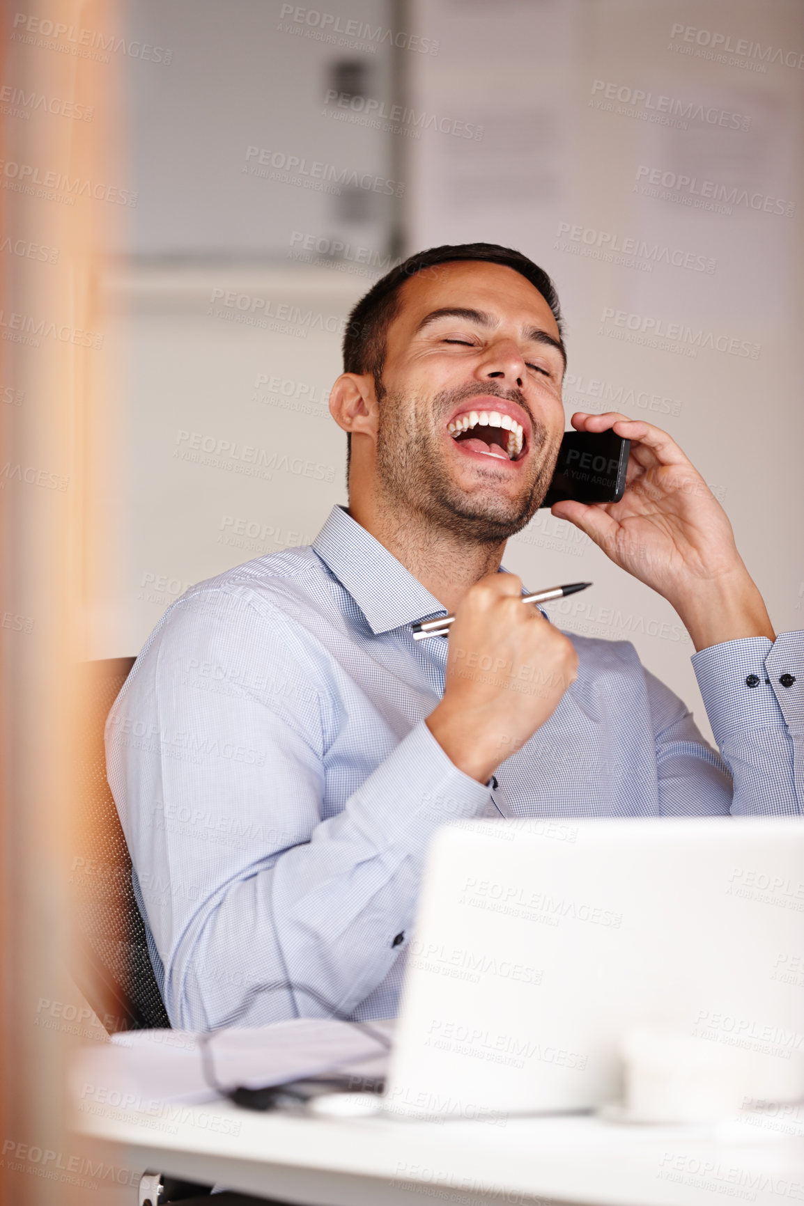 Buy stock photo Man, fist and phone call in office for win, computer and business deal negotiation. Male person, smile and app for conversation or talking, internet and connection for online lottery or promotion