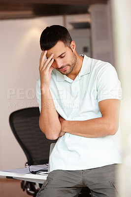 Buy stock photo Man, headache and burnout in office for deadline, stress and debt or tax audit for bankruptcy. Male person, migraine and head pain or tension for anxiety, worry and frustration for  crisis and fail