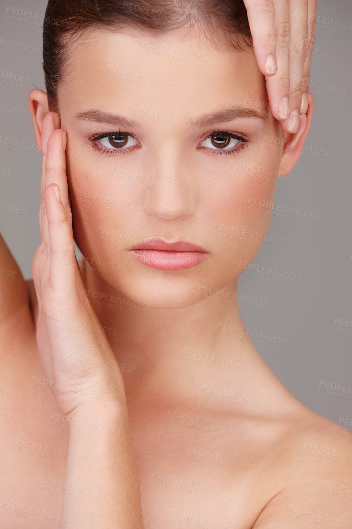 Buy stock photo Portrait, woman and hands in studio for beauty, skincare and  wellness isolated on gray background. Cosmetics, face and dermatology for wellness, facial and confidence with aesthetic and glow.