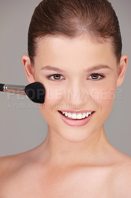 Buy stock photo Woman, smile and portrait with makeup brush for skincare, dermatology and aesthetic cosmetic beauty in studio. Young person or model and happy with clean face for hygiene and fresh with lipstick