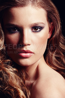 Buy stock photo Closeup portrait of woman isolated against a black studio background. Headshot of serious, beauty glamour model posing with edgy makeup. Face of confident, elegant, gorgeous brunette feeling powerful