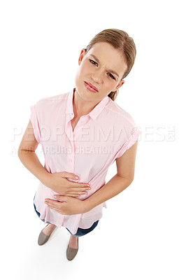 Buy stock photo Portrait, woman and stomach ache in studio with pain, health issue and above. Sick, abdomen and face of isolated female person by white background for medical problem with cramps, gastro and hands