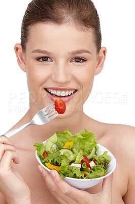 Buy stock photo A teenage girl enjoying a healthy salad