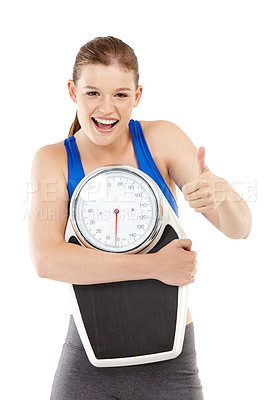 Buy stock photo Portrait of girl, thumbs up and scale for weight loss in studio, measurement and results of fitness goal. Female person, body or care for calories target or achievement, celebrate or white background
