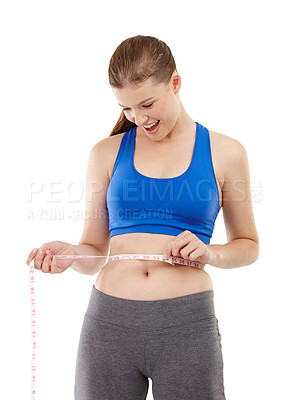 Buy stock photo Goals of woman, surprise and measuring tape in studio for measurement, happy and excited for results of diet. Female person, body and care for calories target, weight loss and white background