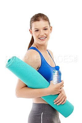 Buy stock photo A pretty teenage girl holding an exercise mat and a water bottle