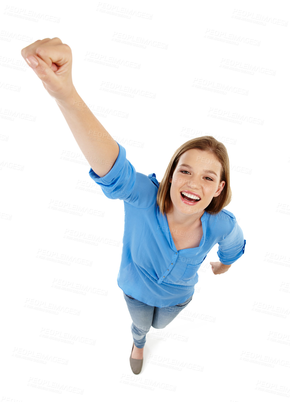 Buy stock photo Girl, fist and power or success in studio for confidence, motivation or superhero pose for learning. Portrait of excited student or winner in top view with yes, victory or soaring on white background